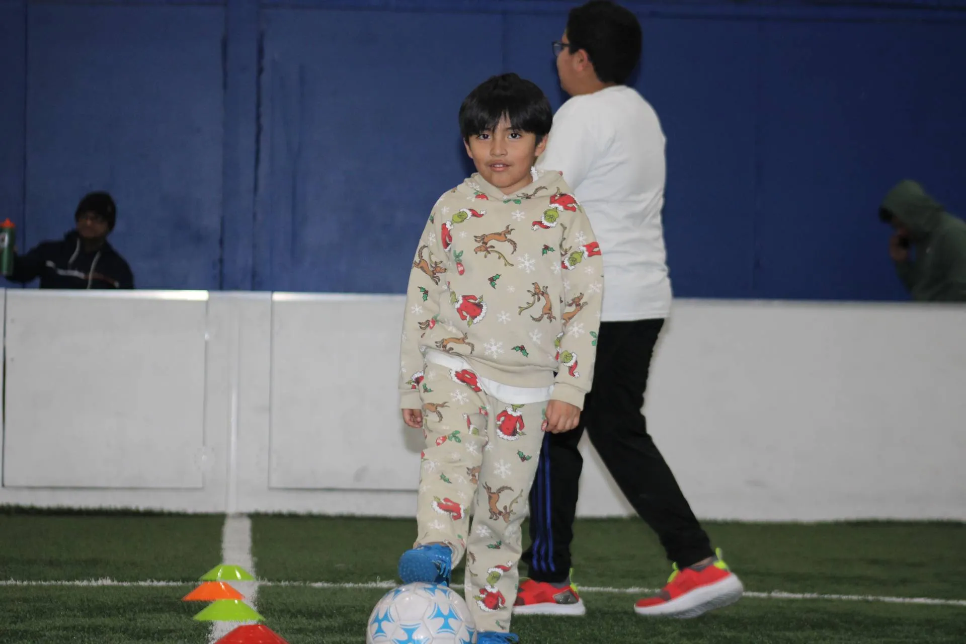 Faith-based soccer academy group devotional with young players