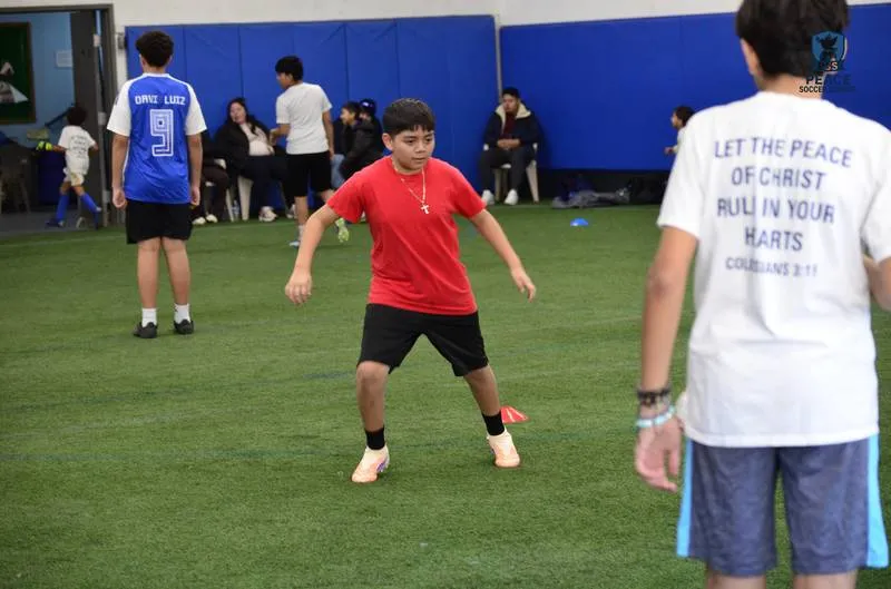 PSS jerseys showing faith-based messages at Christian soccer school